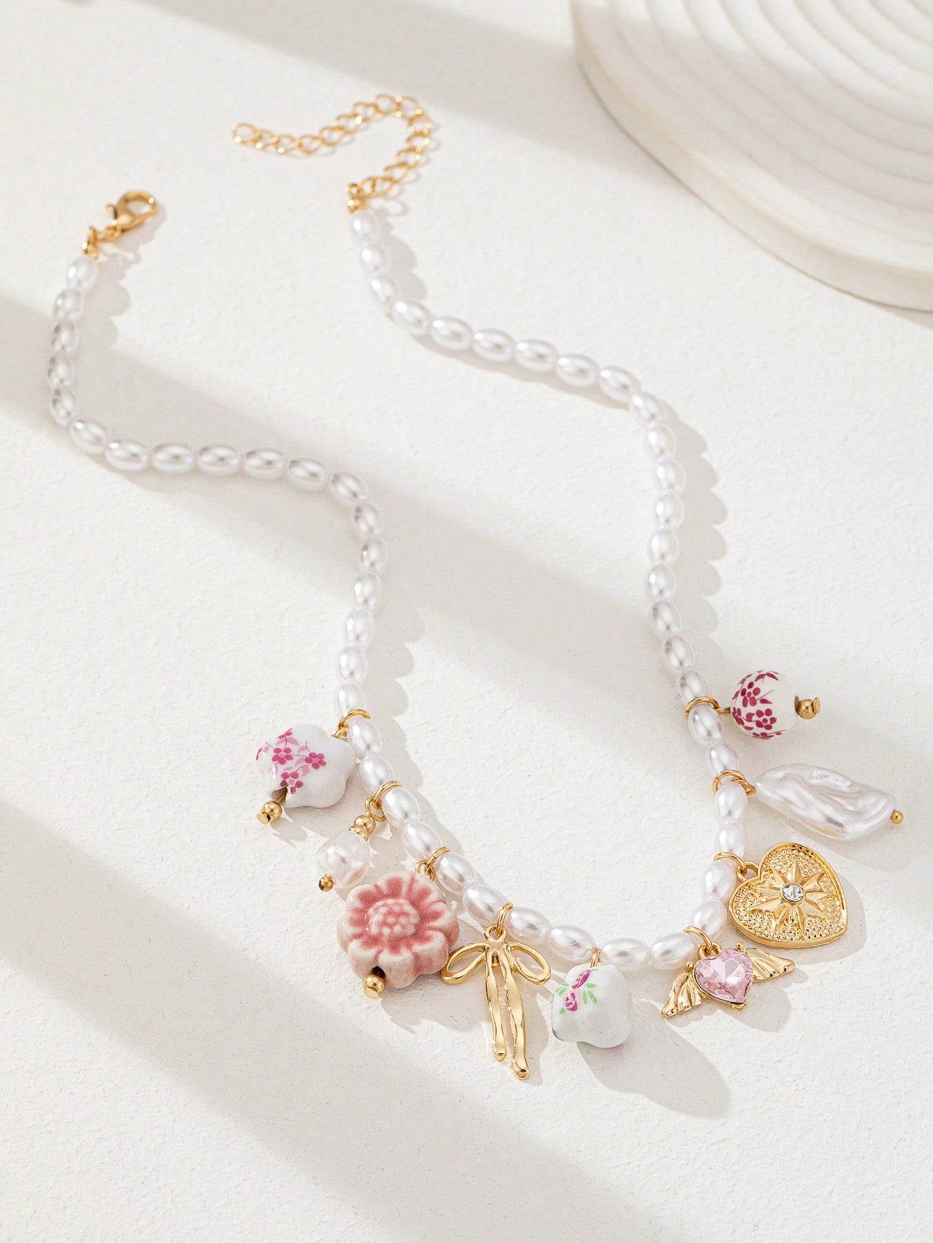 Tasse à thé en céramique fleurie avec collier pendentif cœur
