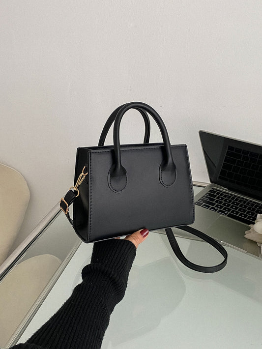 Sac carré noir minimaliste avec poignée, pour travail