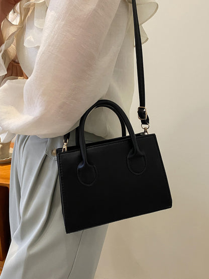 Sac carré noir minimaliste avec poignée, pour travail