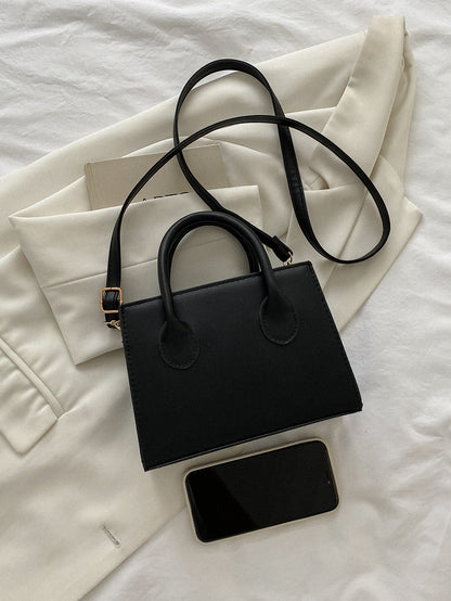 Sac carré noir minimaliste avec poignée, pour travail