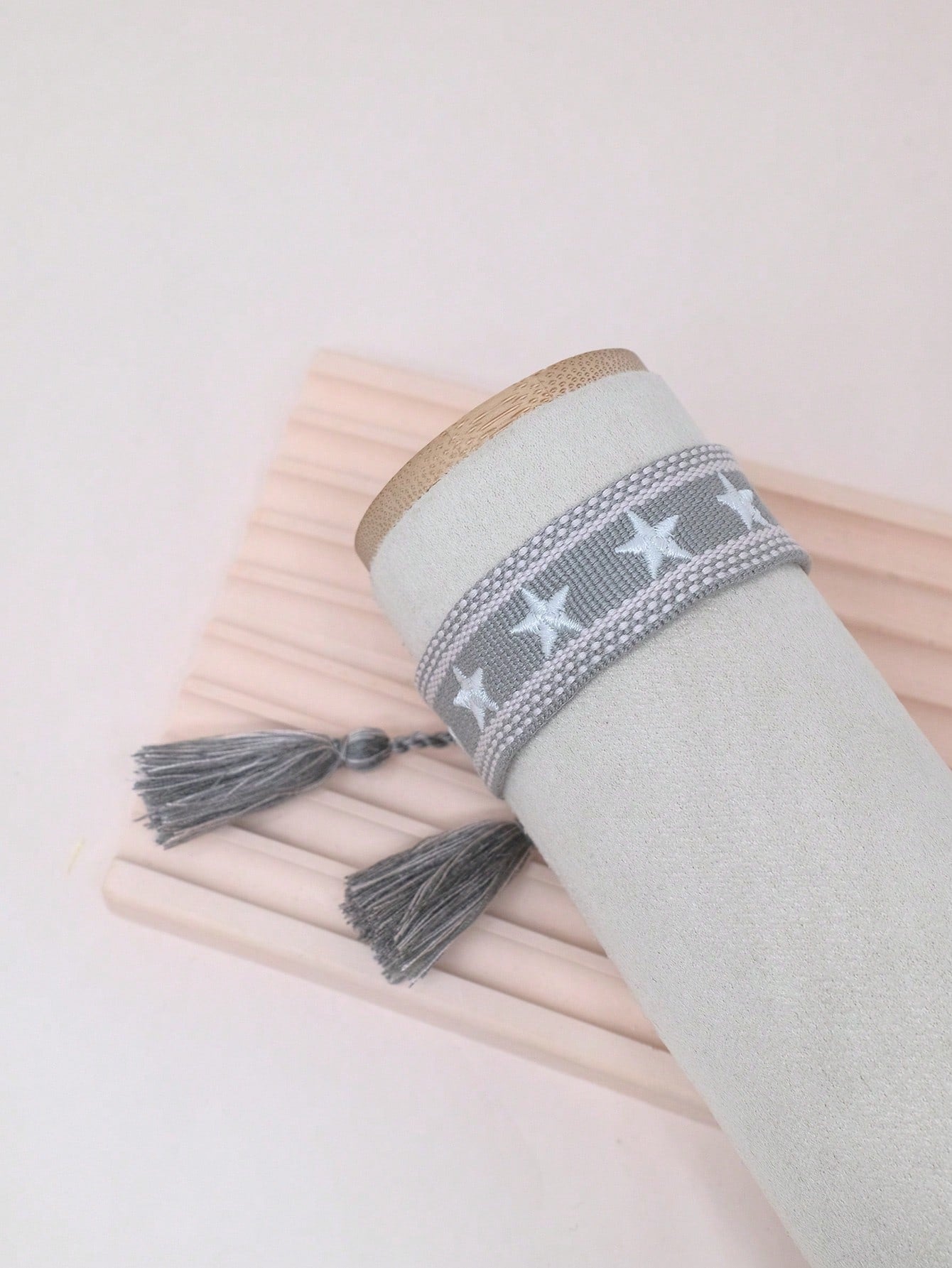 Bracelet étoile brodé à franges