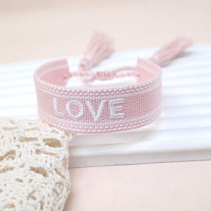 Bracelet tressé franges lettre d'amour brodée