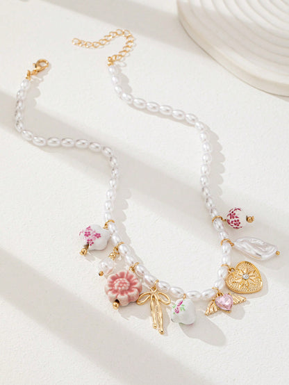 Tasse à thé en céramique fleurie avec collier pendentif cœur
