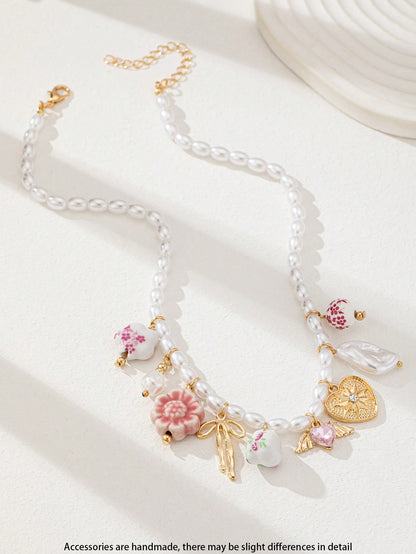 Tasse à thé en céramique fleurie avec collier pendentif cœur