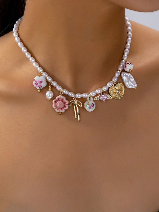 Tasse à thé en céramique fleurie avec collier pendentif cœur