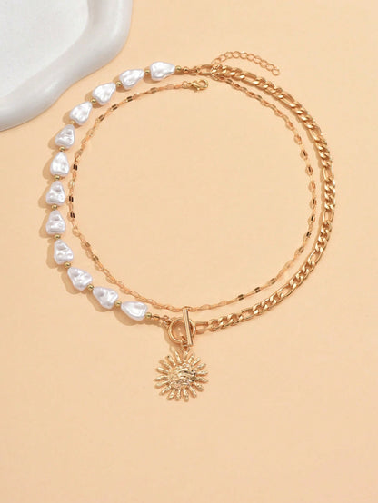 Ensemble 2 colliers perles cœur et soleil punk