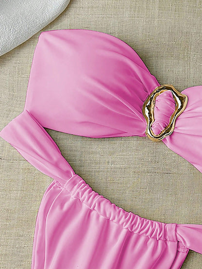 Bikini bandeau et string unie avec décoration métallique