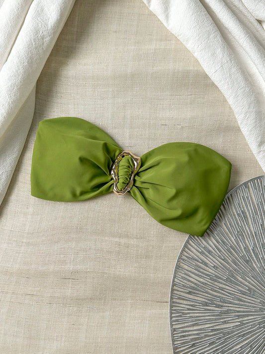 Top de bikini unie avec décoration métallique