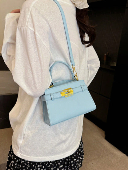 Sac bandoulière femme en PU motif litchi, sangle réglable et fermeture magnétique