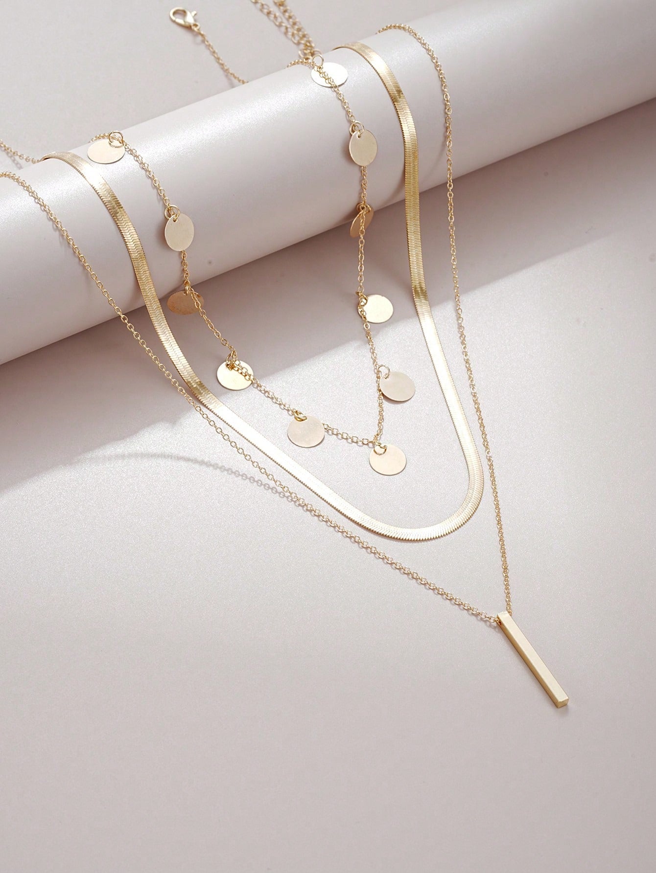 Collier 3 pièces pendentif disque et gland