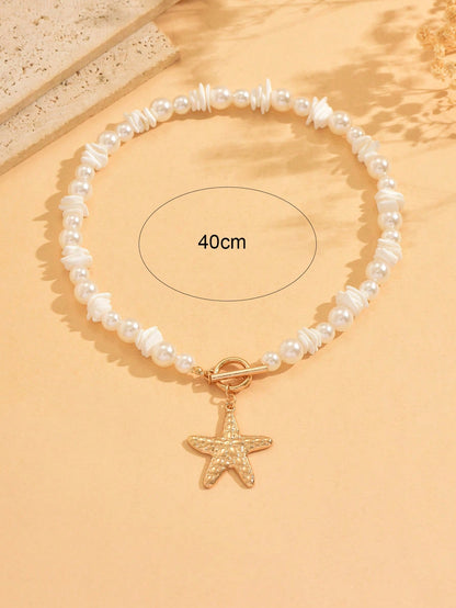 Collier ras du cou perles et pendentif étoile