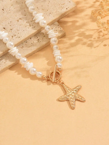 Collier ras du cou perles et pendentif étoile