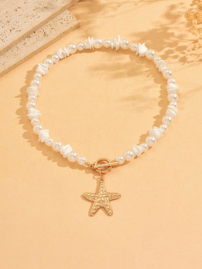 Collier ras du cou perles et pendentif étoile