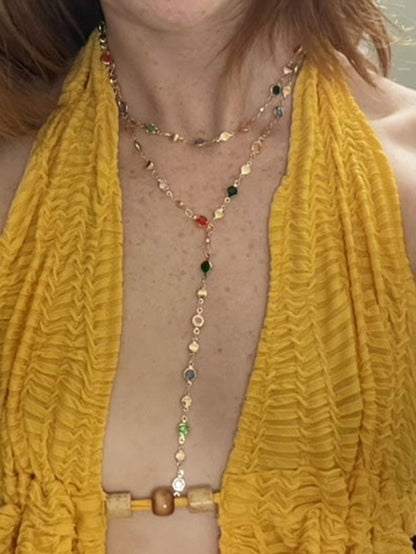 Collier long en métal avec pendentifs cœur, croix et cristal