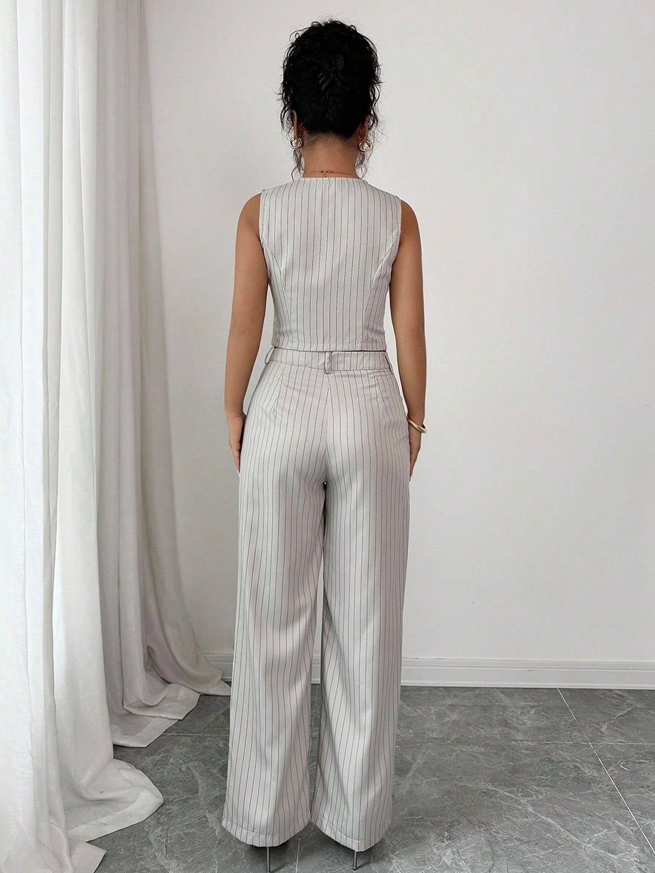 Ensemble femme gilet carreaux et pantalon ample décontracté