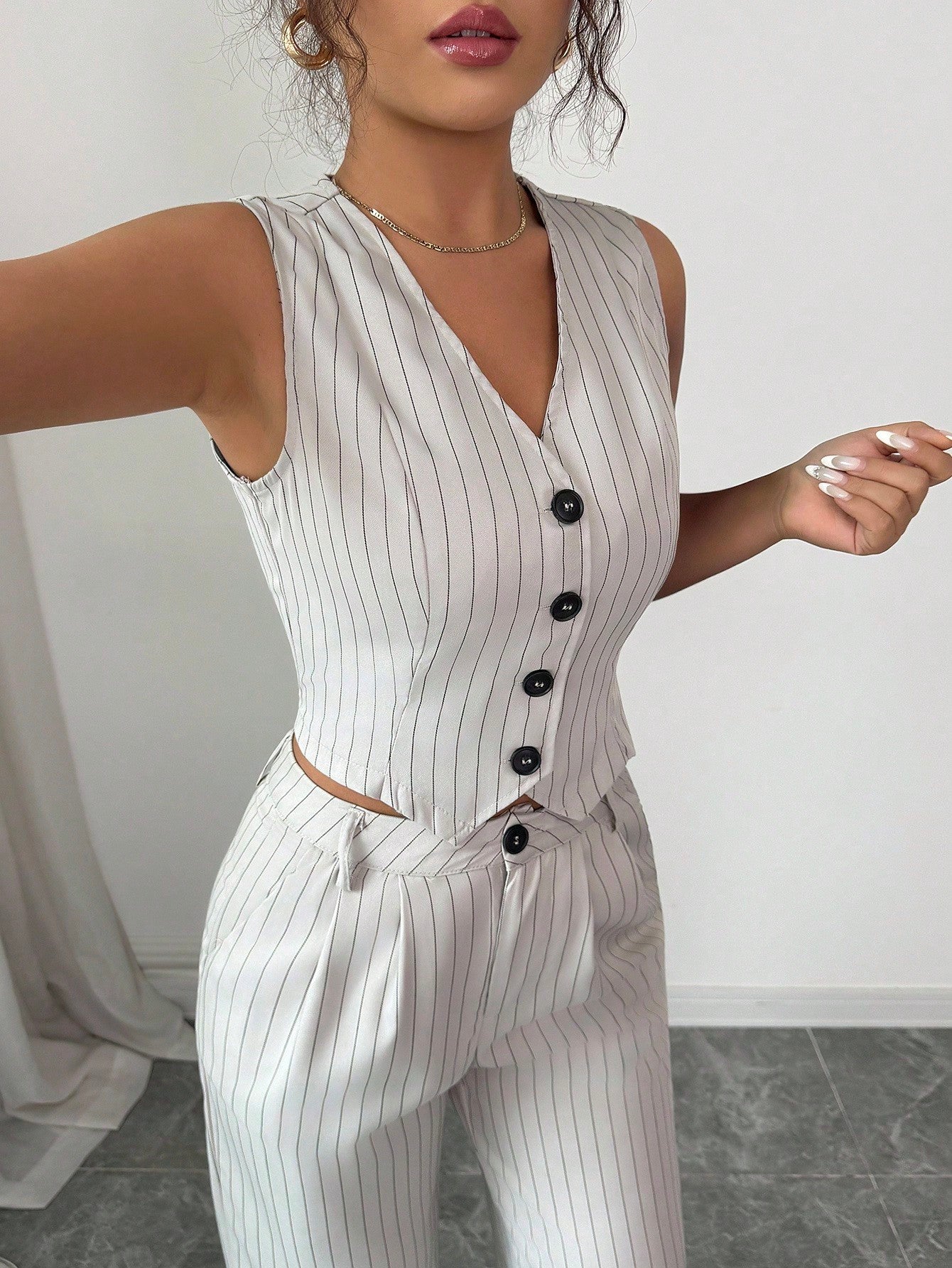 Ensemble femme gilet carreaux et pantalon ample décontracté